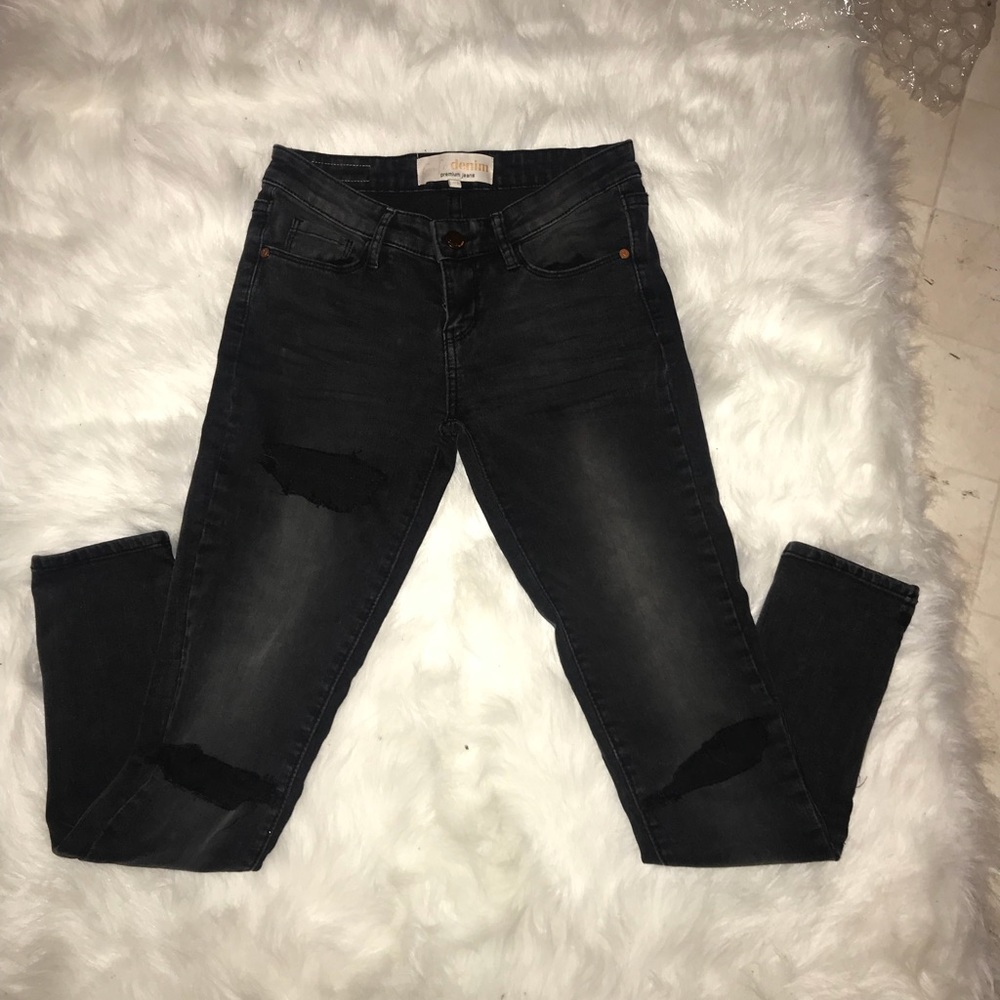 Black jeans with holes